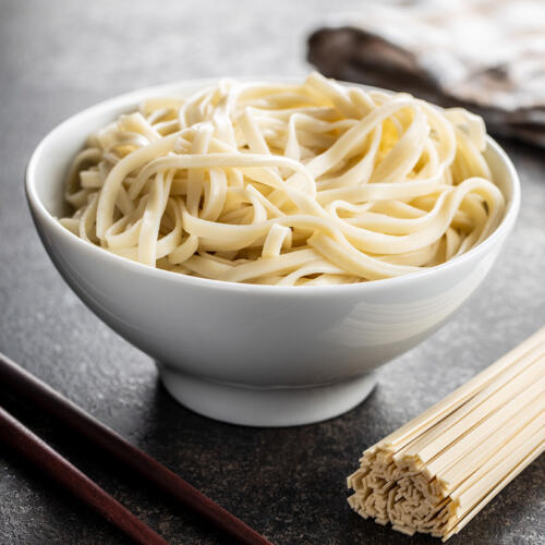 Cooked udon noodles. Traditional Japanese noodles.